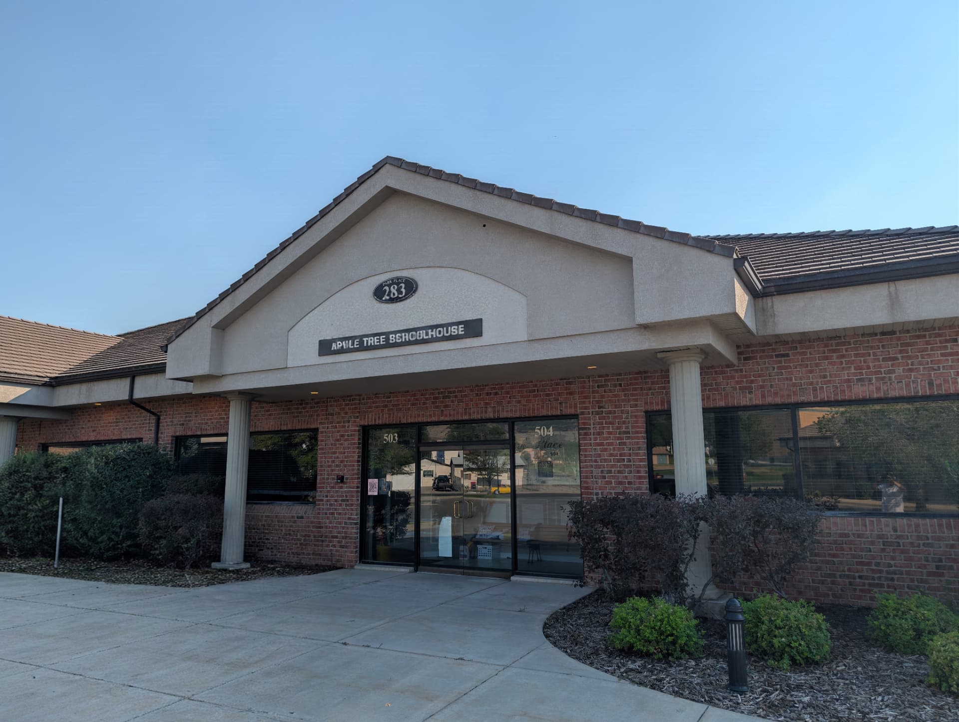 Apple Tree Schoolhouse brick building entrance at 283 North 300 West in Kaysville, Utah